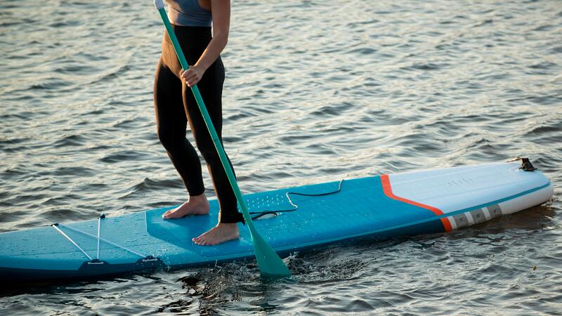 Stand up paddle boarder, in the water around the Porthleven coastline