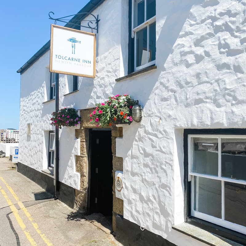 Restaurant entrance located Newlyn harbour in West Cornwall