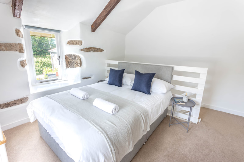 interior layout of bedroom in Sweet Pea holiday cottage in Penzance Cornwall