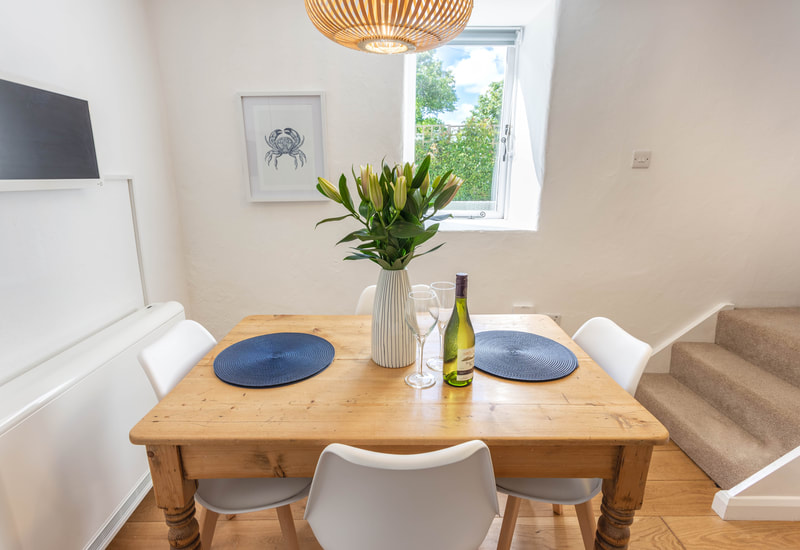 interior layout of dining area in Sweet Pea holiday cottage in Penzance Cornwall