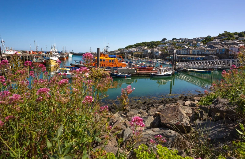 boats in the harbour located in Newlyn Cornwall