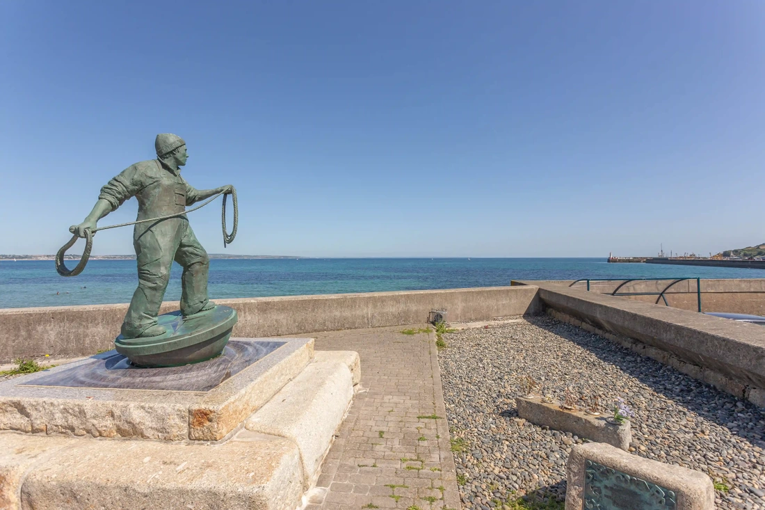 fisherman Statue looking over Newlyn harbour